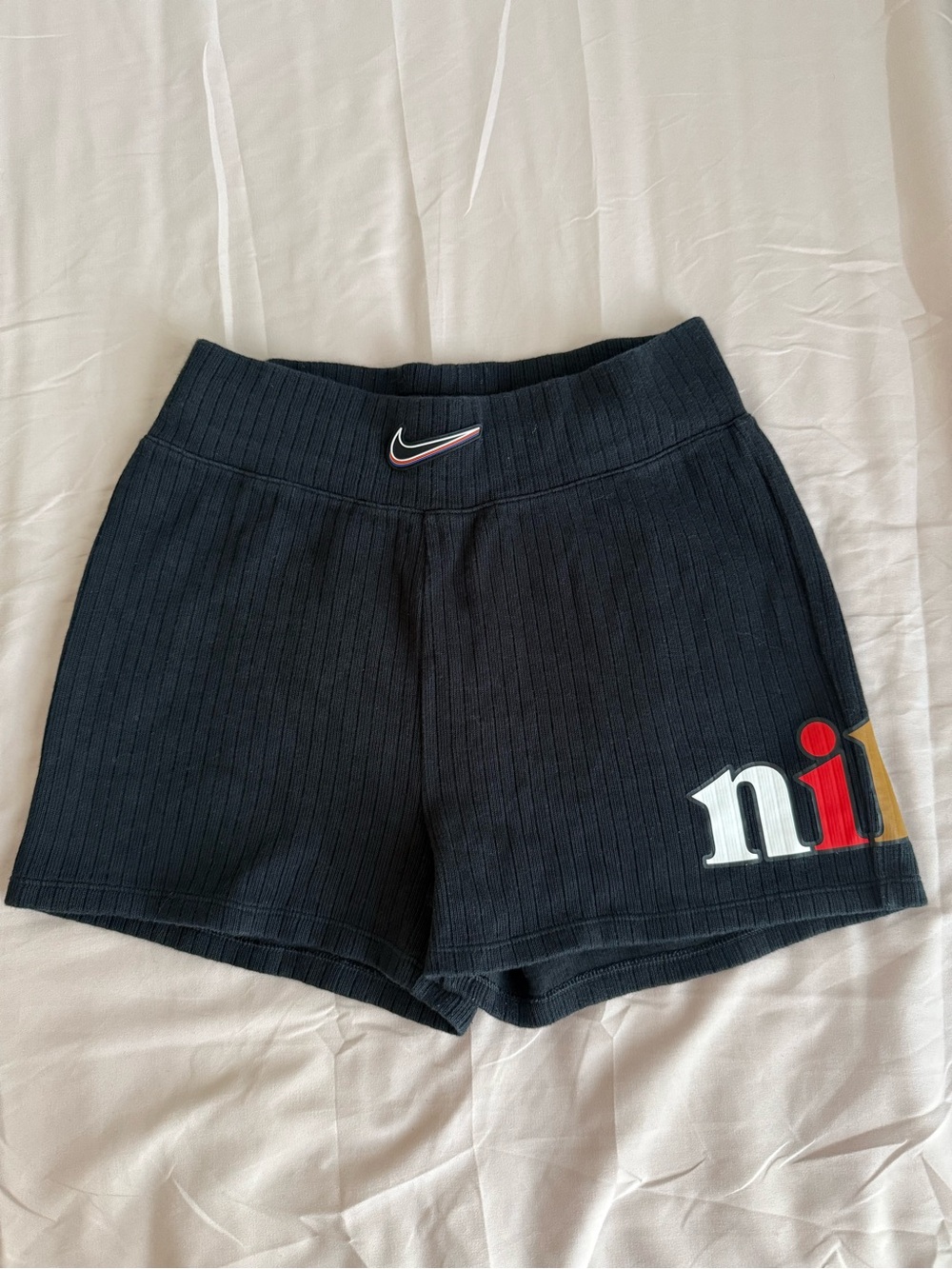 Nike Black Ribbed High-Rise Athletic Shorts with Multicolor 'ni' Detail